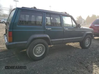 1996 Jeep Cherokee Country with VIN 1J4FJ78S9TL252803, listed as a Copart auction lot 49278184 with 180,420 mi miles and Clean Title. Bid and sale history available at carsss.com. Image 3.