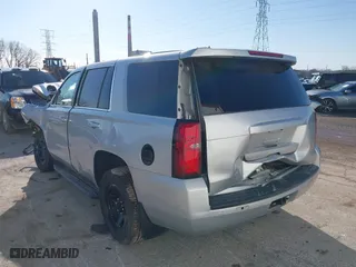 2018 Chevrolet Tahoe Commercial with VIN 1GNSKDEC1JR340887, listed as a IAAI auction lot 41044038 with 99,500 mi miles. Bid and sale history available at carsss.com. Image 3.