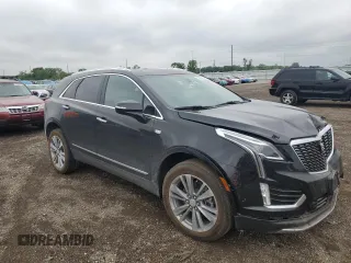 2023 Cadillac XT5 AWD Premium Luxury with VIN 1GYKNDR45PZ224937, listed as a Copart auction lot 57599125 with 12,905 mi miles and Salvage title. Bid and sale history available at DreamBid. Image 4.