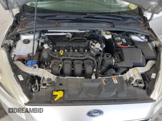 2018 Ford Focus SE z VIN 1FADP3F25JL265168, wystawiony jako Copart lot #56541895 z przebiegiem Nie podano mil oraz Szkoda całkowita • Salvage title. Historia ofert i sprzedaży dostępna na DreamBid. Obrazek 11.
