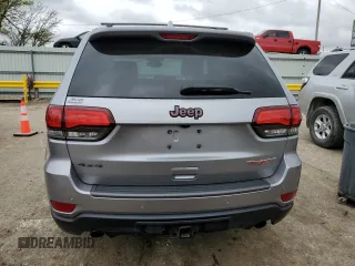 2018 Jeep Grand Cherokee Trailhawk with VIN 1C4RJFLG8JC164774, listed as a Copart auction lot 51699845 with 104,467 mi miles and Salvage title. Bid and sale history available at DreamBid. Image 6.