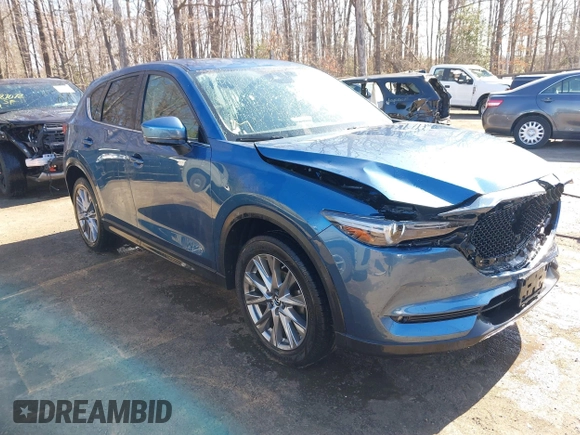 2020 Mazda CX-5 Grand Touring with VIN JM3KFBDM9L0756826, listed as a IAAI auction lot 41866290 with 145,567 mi miles. Bid and sale history available at carsss.com. Image 1.