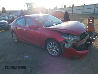 2015 Mazda 3 S Grand Touring z VIN JM1BM1W37F1233557, wystawiony jako IAAI lot #41399458 z przebiegiem 80 674 mil mil oraz . Historia ofert i sprzedaży dostępna na DreamBid. Obrazek 1.