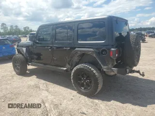 2021 Jeep Wrangler Unlimited Willys with VIN 1C4HJXDN0MW859686, listed as a Copart auction lot 56657725 with 49,984 mi miles and Salvage title. Bid and sale history available at DreamBid. Image 2.