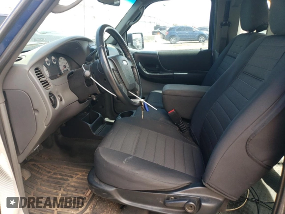 2011 Ford Ranger XLT with VIN 1FTLR4FE9BPA97870, listed as a Copart auction lot 60725915 with 148,338 mi miles and Salvage title. Bid and sale history available at DreamBid. Image 7.