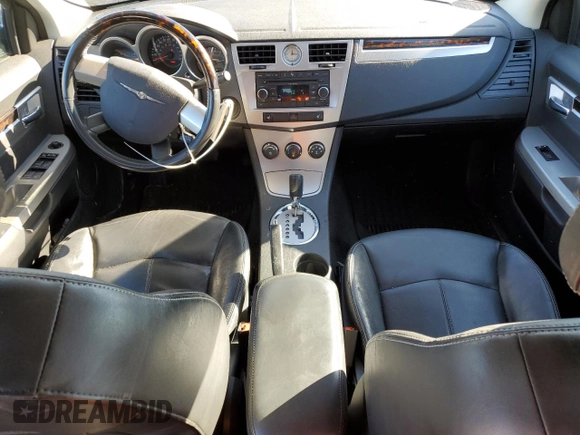 2010 Chrysler Sebring Limited with VIN 1C3CC5FB4AN111539, listed as a Copart auction lot 87454994 with 53,979 mi miles and Salvage Title. Bid and sale history available at DreamBid. Image 8.