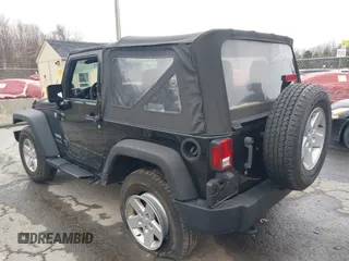 2014 Jeep Wrangler Sport with VIN 1C4AJWAG9EL312856, listed as a IAAI auction lot 42022870 with 98,323 mi miles and . Bid and sale history available at DreamBid. Image 3.