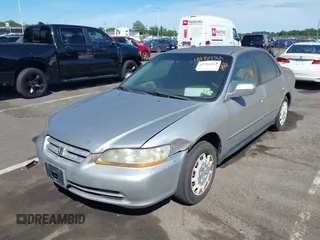 2002 Honda Accord LX with VIN 1HGCG66532A170110, listed as a IAAI auction lot 42784361 with 200,115 mi miles and . Bid and sale history available at DreamBid. Image 2.