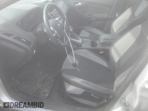 2014 Ford Focus SE with VIN 1FADP3F24EL264003, listed as a Copart auction lot 43800485 with 138,390 mi miles and Salvage Title. Bid and sale history available at DreamBid. Image 7.