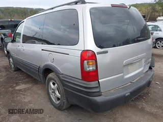 2002 Pontiac Montana with VIN 1GMDX03E92D261204, listed as a IAAI auction lot 41514460 with 175,551 mi miles and . Bid and sale history available at DreamBid. Image 3.