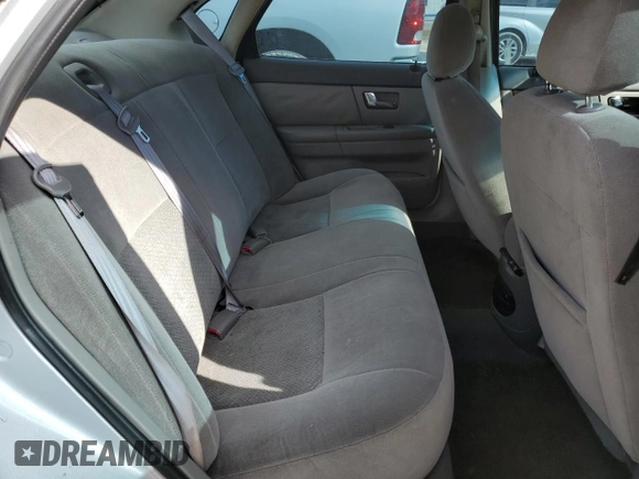 2003 Ford Taurus LX Standard z VIN 1FAFP52U43A110444, wystawiony jako Copart lot #83557764 z przebiegiem 118 897 mil mil oraz Szkoda całkowita • Salvage title. Historia ofert i sprzedaży dostępna na DreamBid. Obrazek 10.