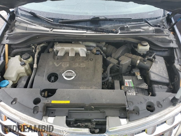 2005 Nissan Murano SL z VIN JN8AZ08T45W318883, wystawiony jako Copart lot #56180225 z przebiegiem 165 436 mil mil oraz Szkoda całkowita • Salvage title. Historia ofert i sprzedaży dostępna na DreamBid. Obrazek 12.