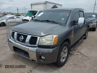 2004 Nissan Titan SE with VIN 1N6AA07AX4N590102, listed as a IAAI auction lot 42575732 with 307,316 mi miles and . Bid and sale history available at DreamBid. Image 2.