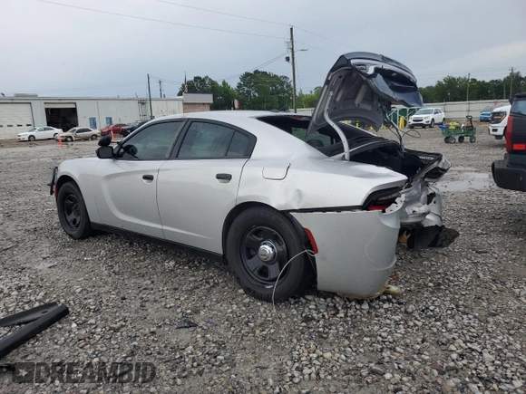 2019 Dodge Charger Police with VIN 2C3CDXATXKH627424, listed as a Copart auction lot 61445815 with 122,296 mi miles and Salvage title. Bid and sale history available at DreamBid. Image 2.