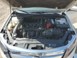 2012 Ford Fusion SEL z VIN 3FAHP0JA3CR336743, wystawiony jako Copart lot #45455065 z przebiegiem 126 456 mil mil oraz Szkody całkowita. Historia ofert i sprzedaży dostępna na DreamBid. Obrazek 11.
