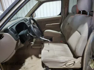 2000 Nissan Frontier XE with VIN 1N6DD26S8YC337811, listed as a Copart auction lot 54775915 with 129,427 mi miles and Salvage title. Bid and sale history available at DreamBid. Image 7.