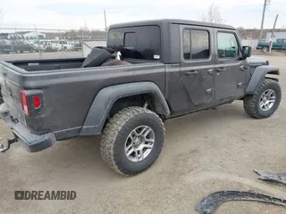 2020 Jeep Gladiator Sport S with VIN 1C6HJTAG8LL141535, listed as a IAAI auction lot 41673860 with 67,160 mi miles. Bid and sale history available at carsss.com. Image 4.