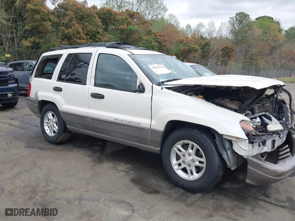 2003 Jeep Grand Cherokee Laredo with VIN 1J4GW48S33C521253, listed as a IAAI auction lot 41929756 with 209,686 mi miles. Bid and sale history available at carsss.com. Image 13.