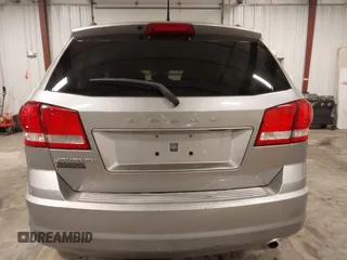 2015 Dodge Journey American Value z VIN 3C4PDCAB9FT675474, wystawiony jako IAAI lot #42078053 z przebiegiem 172 367 mil mil oraz . Historia ofert i sprzedaży dostępna na DreamBid. Obrazek 17.
