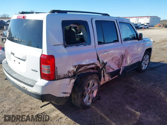 2014 Jeep Patriot Latitude with VIN 1C4NJPFB0ED719270, listed as a IAAI auction lot 40870355 with 207,613 mi miles and . Bid and sale history available at DreamBid. Image 4.