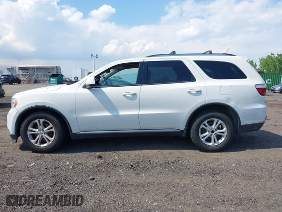2012 Dodge Durango SXT z VIN 1C4RDJAG0CC294998, wystawiony jako IAAI lot #42230396 z przebiegiem 62 963 mil mil oraz . Historia ofert i sprzedaży dostępna na DreamBid. Obrazek 14.