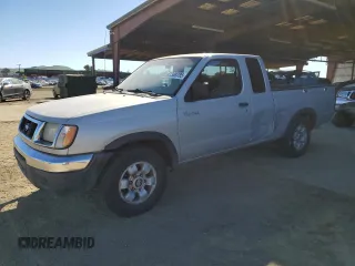 1999 Nissan Frontier XE with VIN 1N6DD26S0XC341365, listed as a Copart auction lot 47308785 with 221,174 mi miles and Salvage title. Bid and sale history available at DreamBid. Image 1.