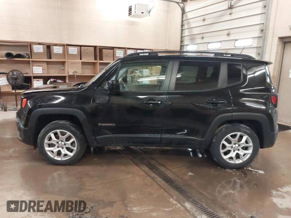 2015 Jeep Renegade Latitude with VIN ZACCJBBT0FPB52572, listed as a IAAI auction lot 41835191 with 69,030 mi miles and . Bid and sale history available at DreamBid. Image 14.