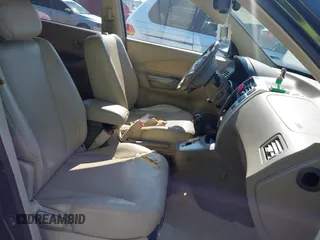 2006 Hyundai Tucson GLS with VIN KM8JN12D16U418088, listed as a IAAI auction lot 41478091 with 157,403 mi miles. Bid and sale history available at carsss.com. Image 5.
