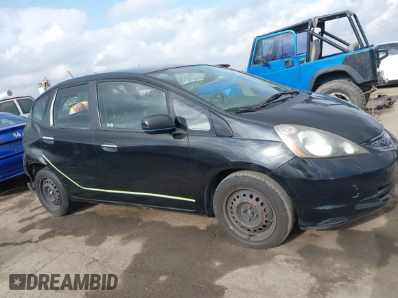 2010 Honda Fit with VIN JHMGE8H21AC039375, listed as a IAAI auction lot 42126138 with 123,077 mi miles. Bid and sale history available at carsss.com. Image 13.