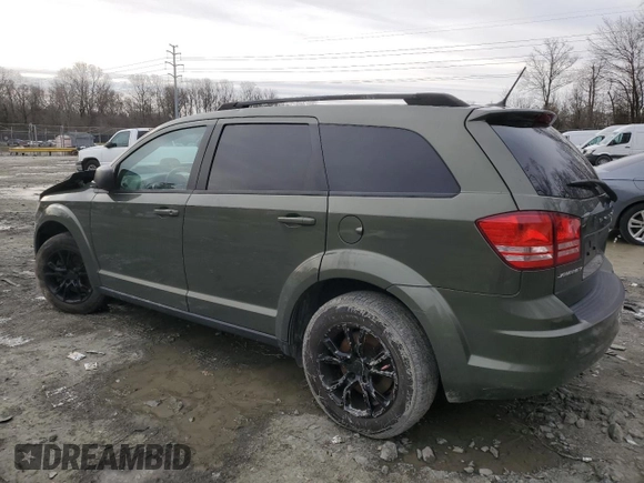 2018 Dodge Journey SE with VIN 3C4PDCAB7JT445621, listed as a Copart auction lot 43879445 with 100,700 mi miles and Salvage Title. Bid and sale history available at carsss.com. Image 2.