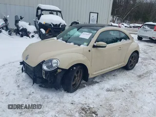 2019 Volkswagen Beetle S with VIN 3VWFD7AT1KM703684, listed as a IAAI auction lot 41571691 with 111,180 mi miles. Bid and sale history available at carsss.com. Image 2.