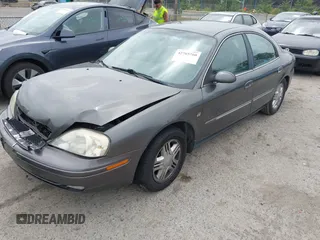 2002 Mercury Sable LS Premium with VIN 1MEHM55S22G612417, listed as a IAAI auction lot 42765760 with 102,735 mi miles and . Bid and sale history available at DreamBid. Image 2.