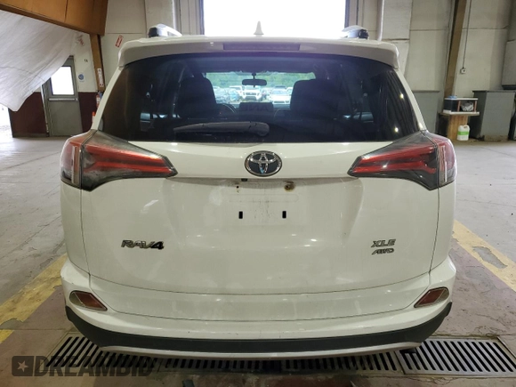 2016 Toyota RAV4 XLE с VIN JTMRFREV8GD191572, выставлен на аукционе Copart как лот 61609975 с пробегом 140 648 миль миль и Списание • Salvage title. История ставок и продаж доступна на DreamBid. Изображение 6.