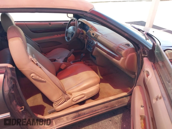 2001 Chrysler Sebring LXi z VIN 1C3EL55U61N638770, wystawiony jako IAAI lot #42228671 z przebiegiem 87 579 mil mil oraz . Historia ofert i sprzedaży dostępna na DreamBid. Obrazek 5.