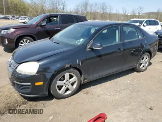 2009 Volkswagen Jetta z VIN 3VWHZ71K79M134285, wystawiony jako Copart lot #54414605 z przebiegiem 149 806 mil mil oraz Czysty tytuł • Clean title. Historia ofert i sprzedaży dostępna na DreamBid. Obrazek 1.