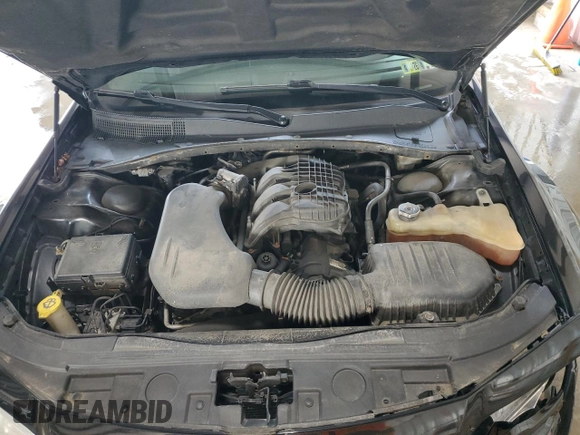 2014 Chrysler 300 z VIN 2C3CCAAG0EH132608, wystawiony jako Copart lot #59217075 z przebiegiem 215 836 mil mil oraz Szkoda całkowita • Salvage title. Historia ofert i sprzedaży dostępna na DreamBid. Obrazek 11.