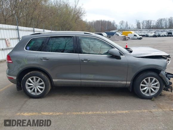 2016 Volkswagen Touareg Sport with VIN WVGEF9BPXGD012206, listed as a IAAI auction lot 42115314 with Not Provided miles and . Bid and sale history available at DreamBid. Image 13.