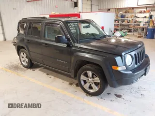 2014 Jeep Patriot Latitude with VIN 1C4NJPFA0ED633657, listed as a IAAI auction lot 41447982 with 104,664 mi miles and . Bid and sale history available at carsss.com. Image 1.