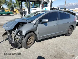 2010 Honda Insight EX z VIN JHMZE2H73AS034380, wystawiony jako Copart lot #49178935 z przebiegiem 214 256 mil mil oraz Szkoda całkowita • Salvage title. Historia ofert i sprzedaży dostępna na DreamBid. Obrazek 1.