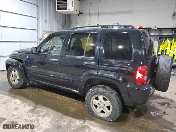 2004 Jeep Liberty Limited with VIN 1J4GL58K84W177787, listed as a Copart auction lot 88910535 with 143,779 mi miles and Salvage Title. Bid and sale history available at carsss.com. Image 2.