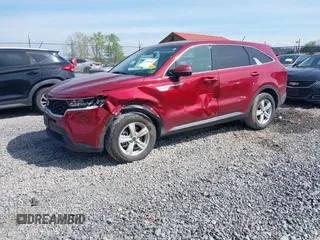 2021 Kia Sorento LX with VIN 5XYRG4LC1MG052981, listed as a IAAI auction lot 42199446 with 82,634 mi miles and . Bid and sale history available at DreamBid. Image 2.
