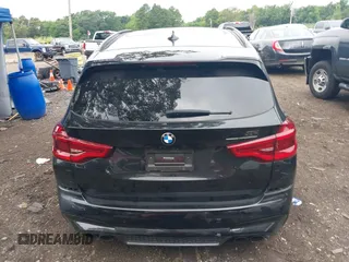 2021 BMW X3 M with VIN 5YMTS0C09M9E42418, listed as a IAAI auction lot 39904954 with 1 mi miles. Bid and sale history available at carsss.com. Image 15.