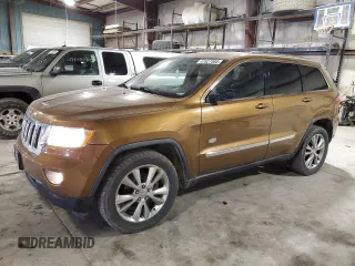 2011 Jeep Grand Cherokee Laredo with VIN 1J4RR4GG6BC675290, listed as a Copart auction lot 47627585 with 142,195 mi miles and Salvage Title. Bid and sale history available at carsss.com. Image 1.