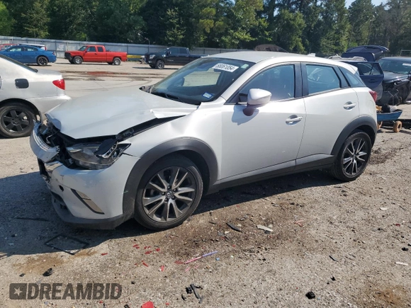 2018 Mazda CX-3 Touring with VIN JM1DKDC75J0329502, listed as a Copart auction lot 68061054 with 92,238 mi miles and Salvage Title. Bid and sale history available at carsss.com. Image 1.
