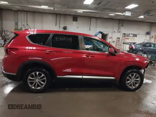 2019 Hyundai Santa Fe SE z VIN 5NMS2CAD3KH125454, wystawiony jako IAAI lot #42400534 z przebiegiem 75 155 mil mil oraz . Historia ofert i sprzedaży dostępna na DreamBid. Obrazek 14.