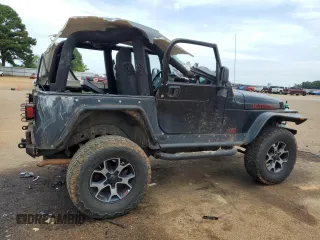 2005 Jeep Wrangler Rubicon with VIN 1J4FA69S75P340544, listed as a Copart auction lot 73085774 with 104,046 mi miles and Salvage Title. Bid and sale history available at carsss.com. Image 3.