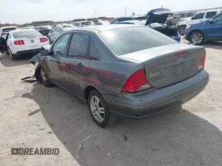 2004 Ford Focus ZTS with VIN 1FAFP38Z94W165483, listed as a IAAI auction lot 41775001 with 222,589 mi miles and . Bid and sale history available at carsss.com. Image 3.