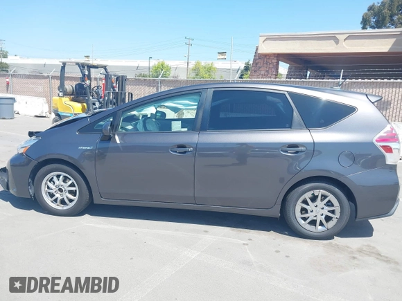 2015 Toyota Prius Two with VIN JTDZN3EUXFJ027926, listed as a IAAI auction lot 42036024 with 104,976 mi miles and . Bid and sale history available at DreamBid. Image 14.