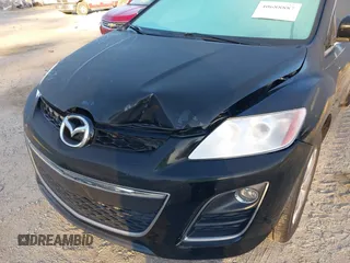 2010 Mazda CX-7 Touring z VIN JM3ER2W35A0351794, wystawiony jako IAAI lot #40688887 z przebiegiem 147 308 mil mil oraz . Historia ofert i sprzedaży dostępna na DreamBid. Obrazek 6.