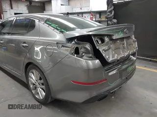 2015 Kia Optima SX Turbo with VIN 5XXGR4A6XFG469733, listed as a IAAI auction lot 42494569 with 145,397 mi miles and . Bid and sale history available at DreamBid. Image 6.